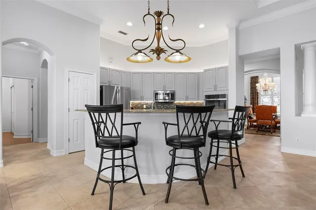 a spacious bathroom with a granite countertop tub and a sink