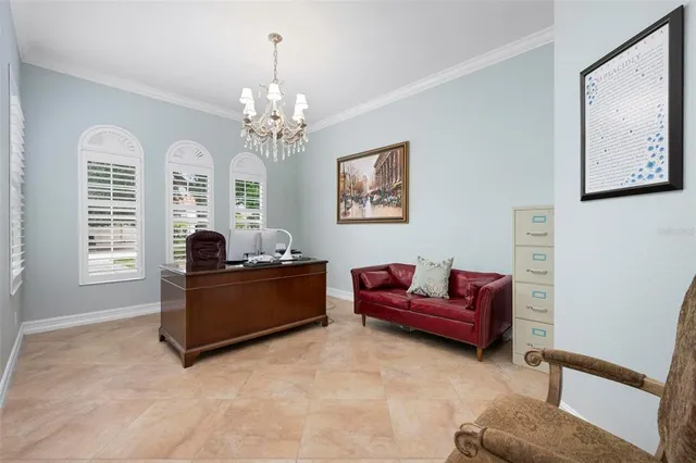 a spacious bathroom with a sink and a mirror