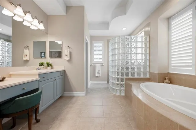 a view of a backyard with swimming pool