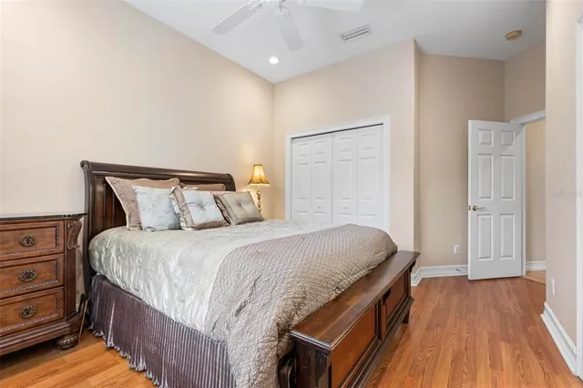a view of a livingroom with furniture and floor to ceiling window