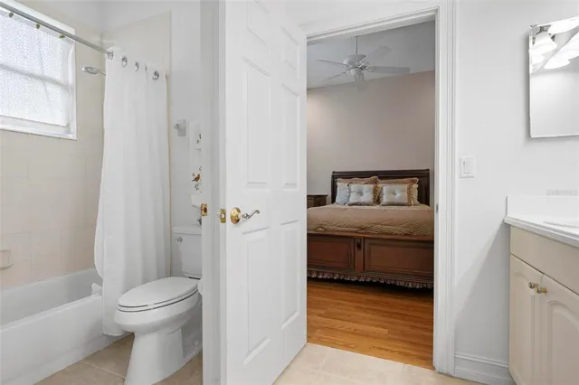 a view of a swimming pool with sitting area