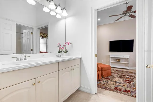a view of a house with a big yard and potted plants