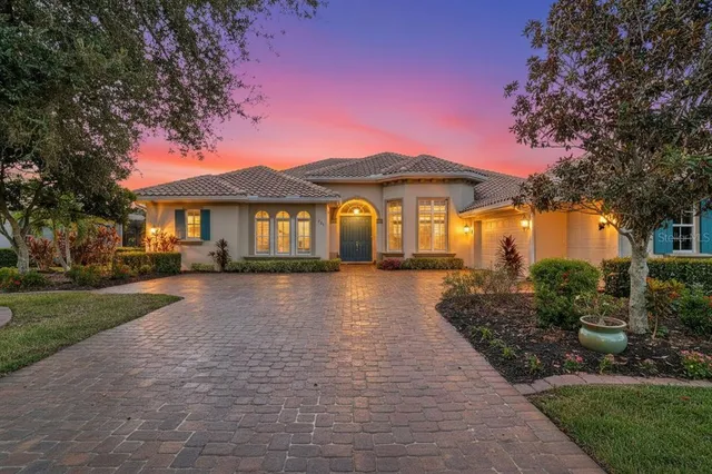 a living room with fireplace furniture and a flat screen tv