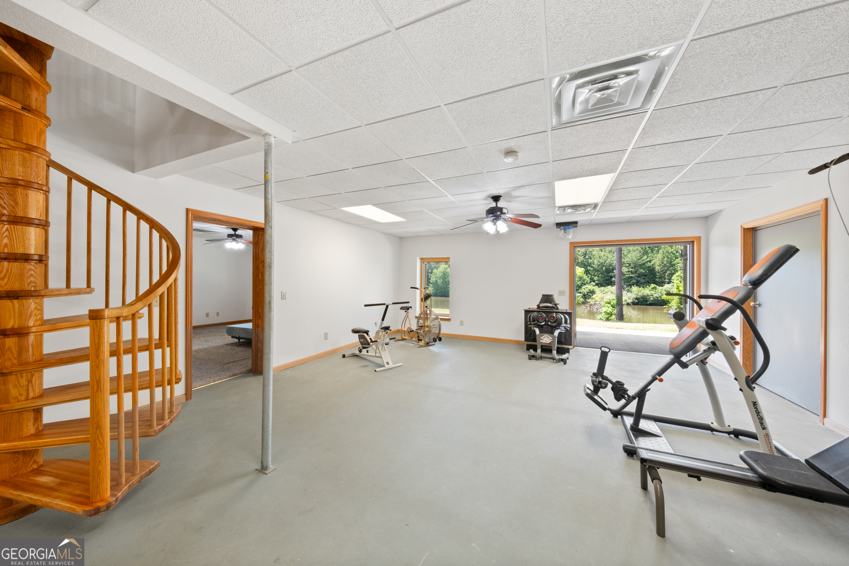 115 Old Stewart Road Forsyth, GA 31029 - Photo 17 of 32 a view of a room with gym equipment