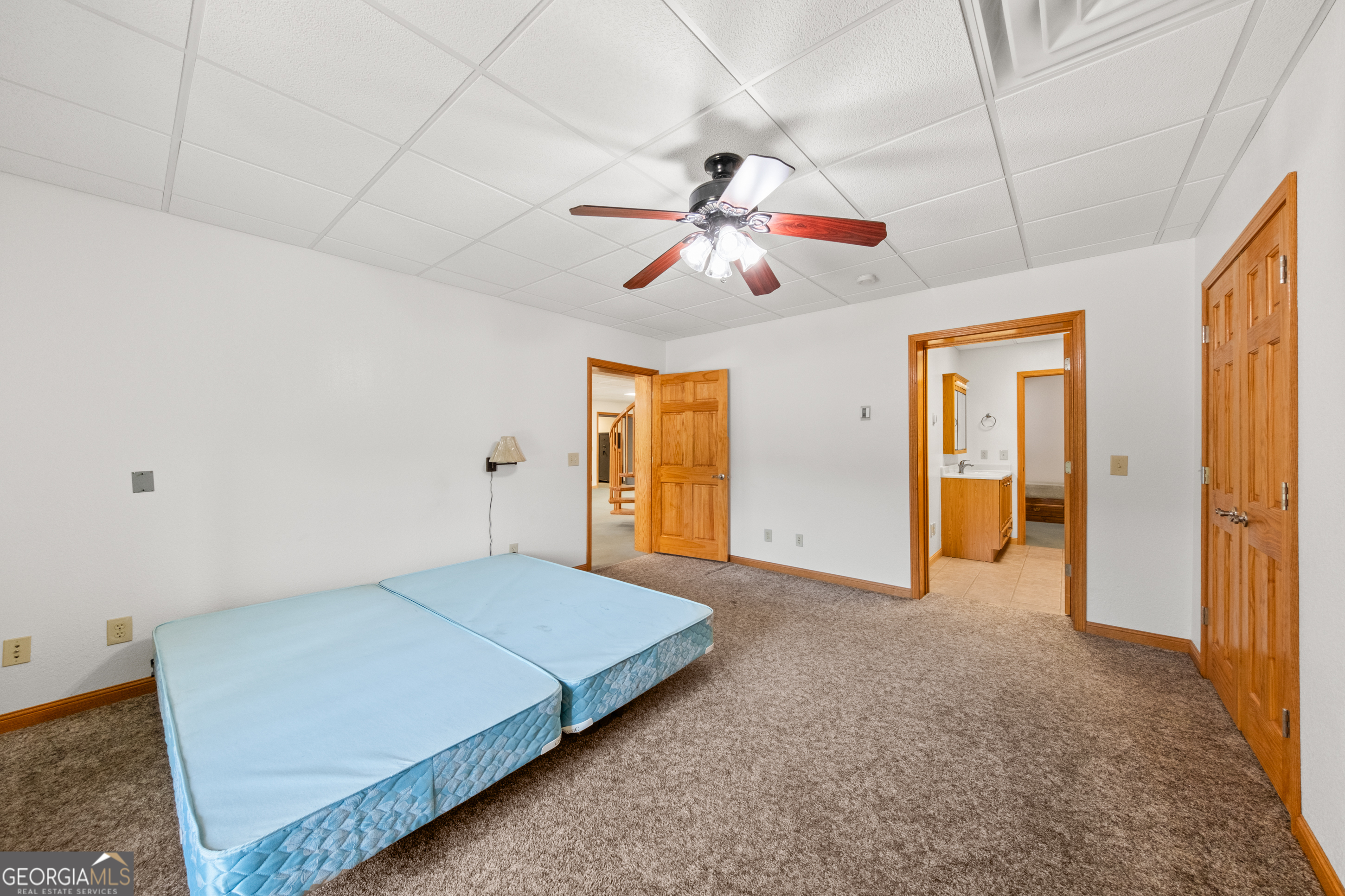 115 Old Stewart Road Forsyth, GA 31029 - Photo 19 of 32 a view of a livingroom with a chandelier furniture and windows