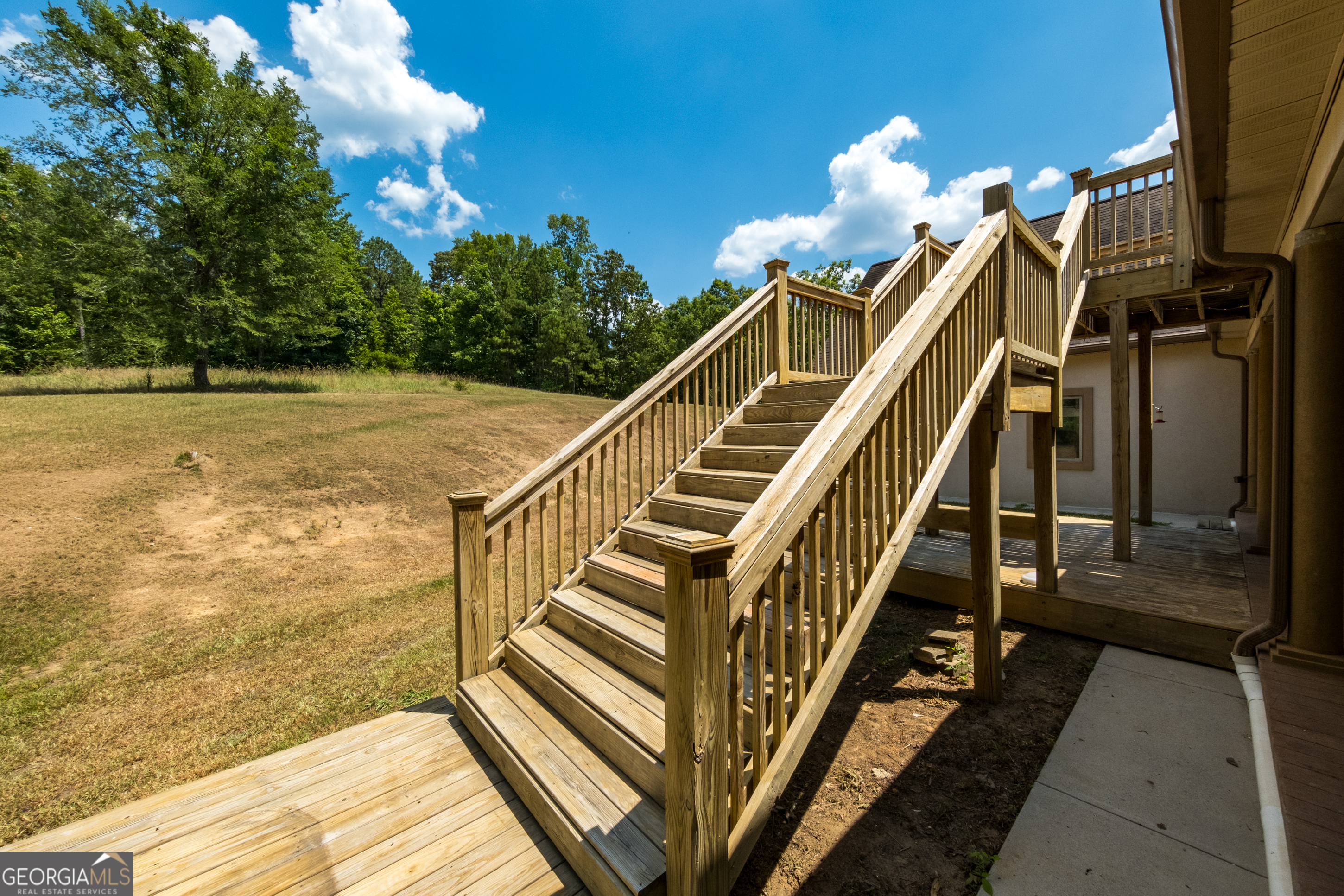 115 Old Stewart Road Forsyth, GA 31029 - Photo 23 of 32 a view of entryway and hall with wooden floor