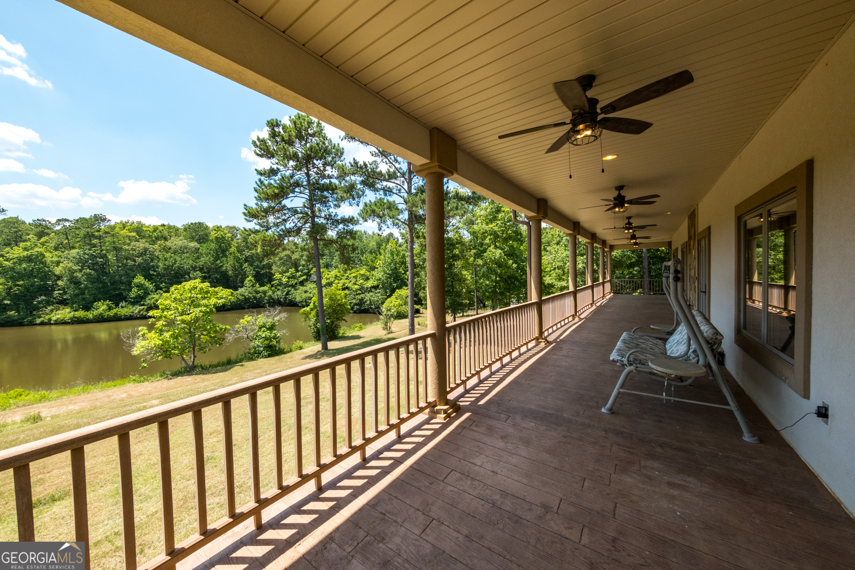115 Old Stewart Road Forsyth, GA 31029 - Photo 27 of 32 a view of a porch with wooden floor and outdoor space