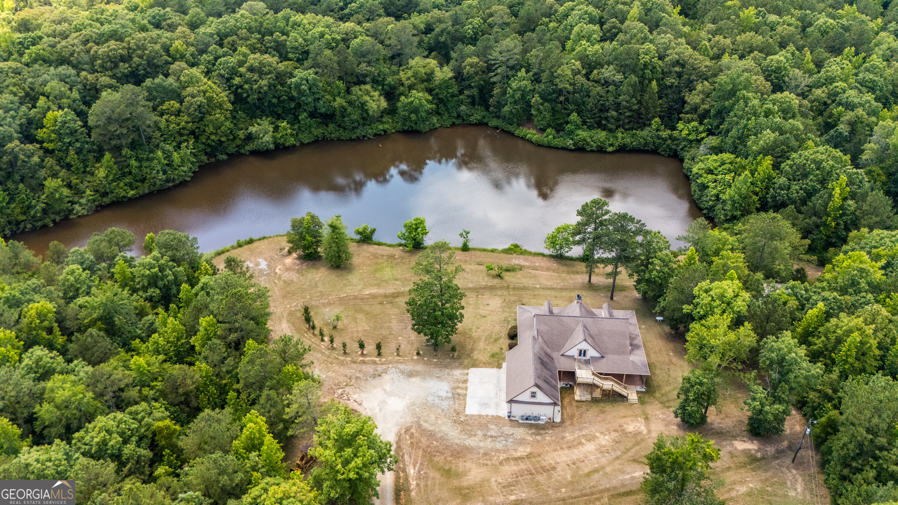 115 Old Stewart Road Forsyth, GA 31029 - Photo 3 of 32 an aerial view of a house with yard and lake view