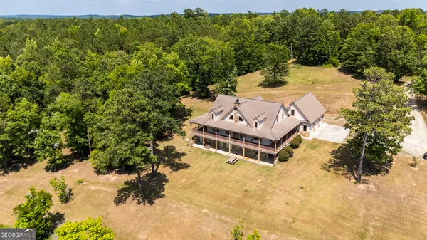 a view of a lake with a yard