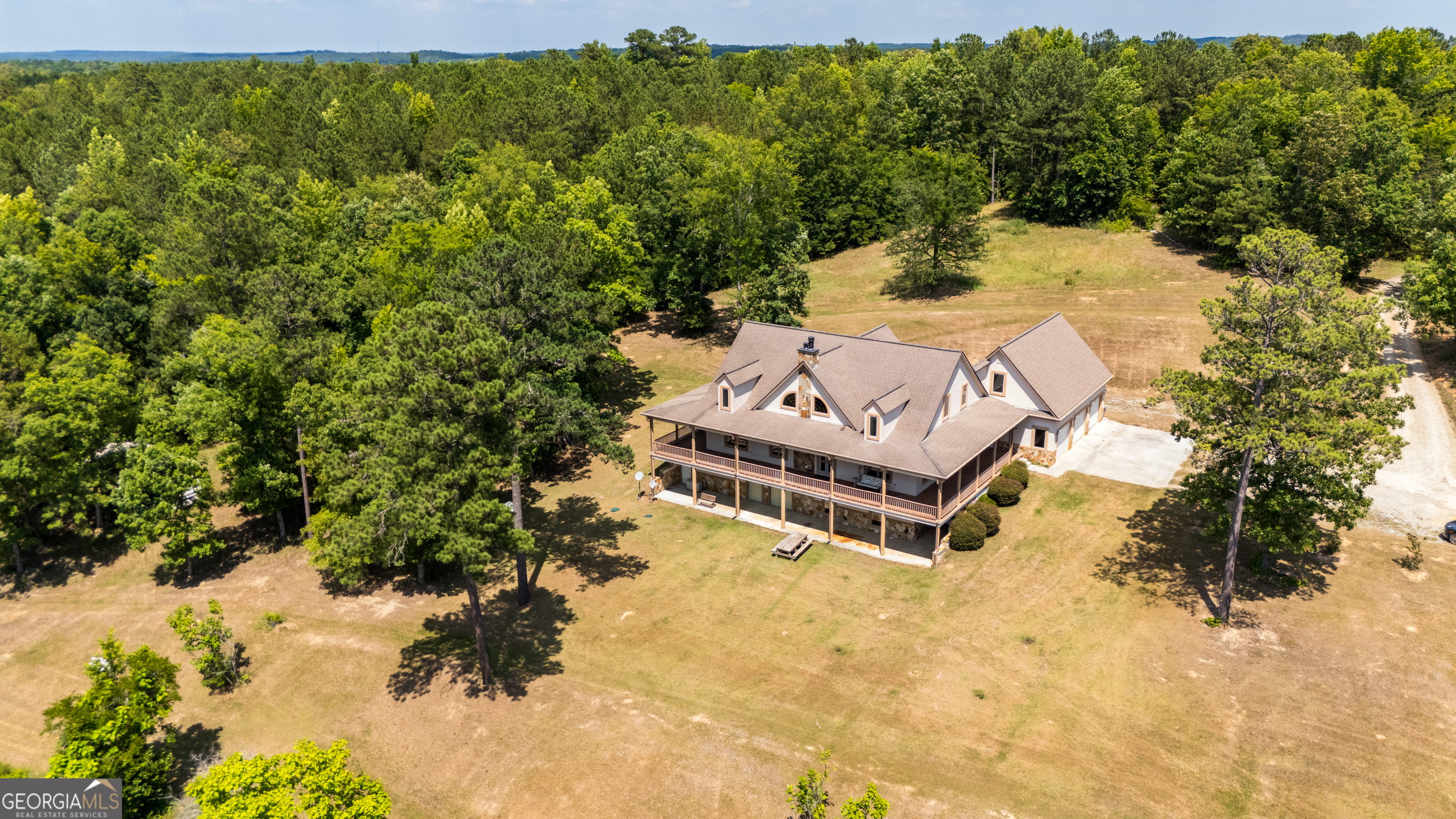 115 Old Stewart Road Forsyth, GA 31029 - Photo 4 of 32 a view of a lake with a yard
