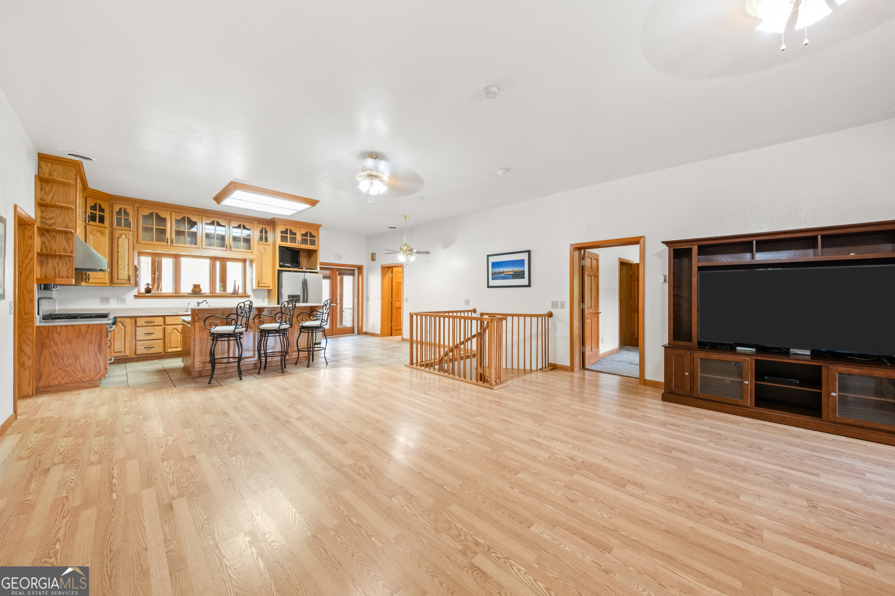 115 Old Stewart Road Forsyth, GA 31029 - Photo 9 of 32 a living room with furniture and a flat screen tv