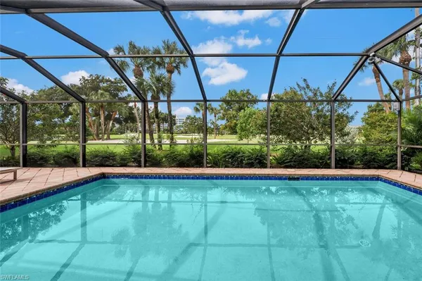a view of a house with a swimming pool