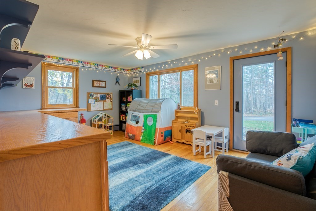 971 Ryan Road Northampton, MA 01062 - Photo 13 of 23 a living room with furniture and a flat screen tv