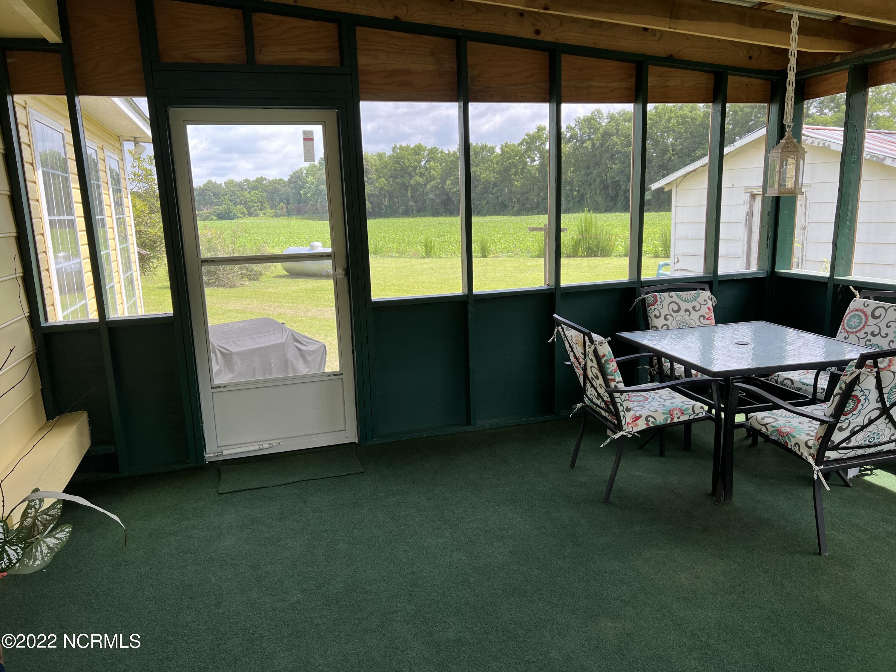 1421 Needmore Road Turkey, NC 28393 - Photo 45 of 49 Screened back porch