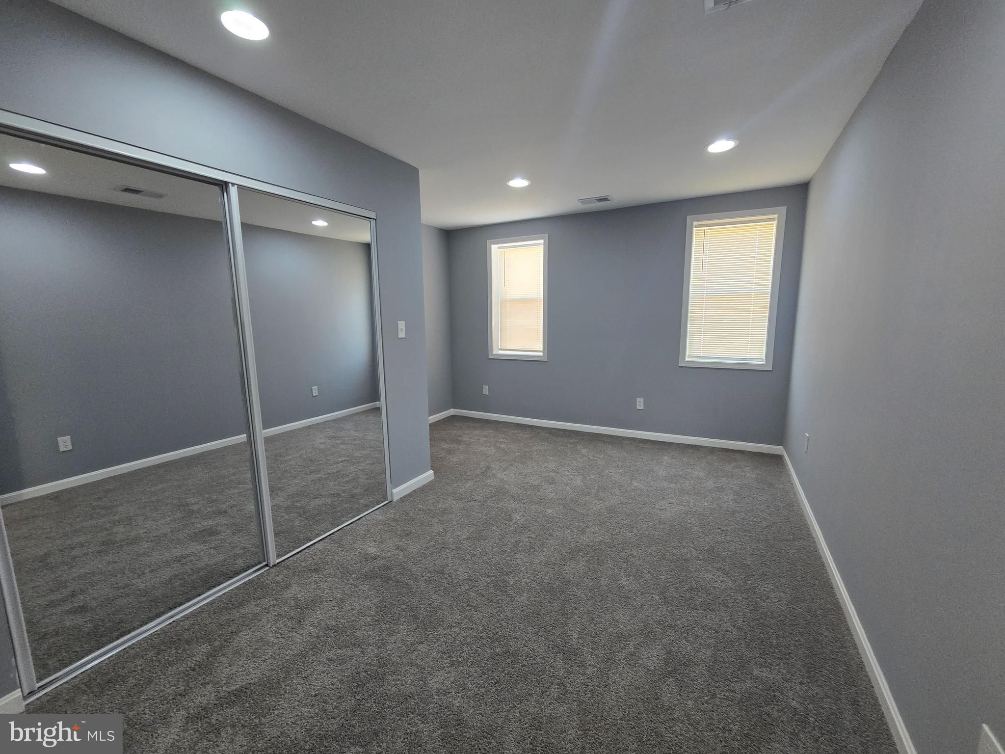 1926 North Payson Street Baltimore, MD 21217 - Photo 16 of 29 an empty room with windows and gate