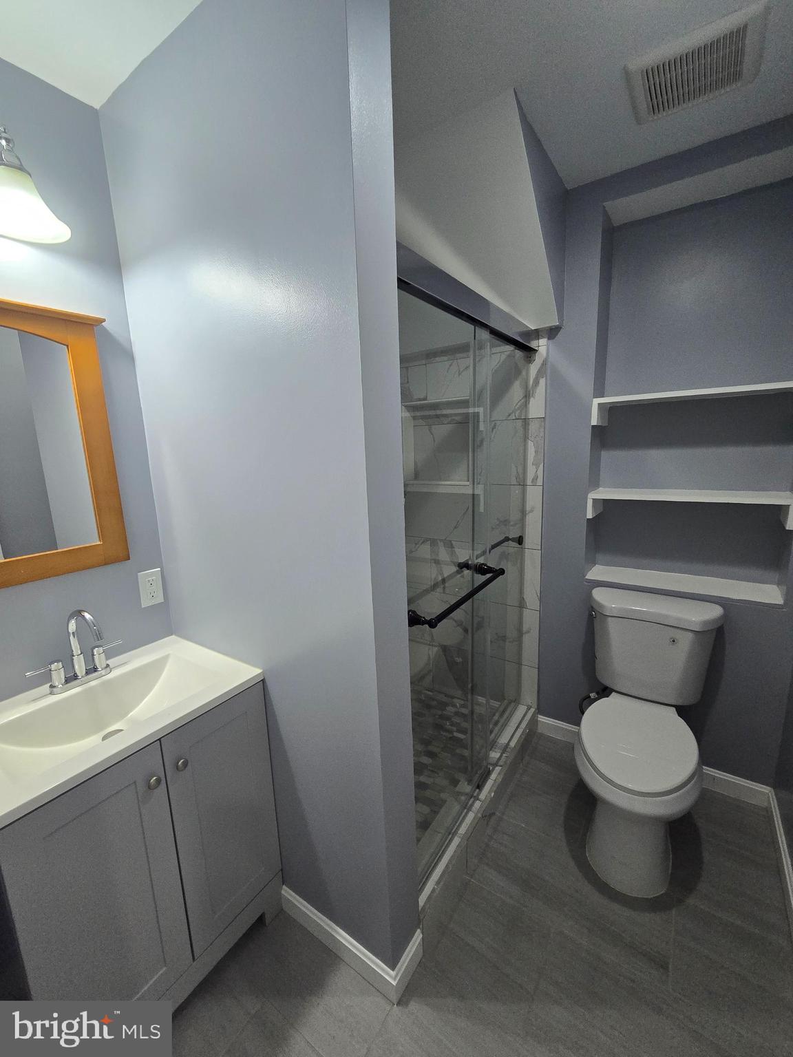 1926 North Payson Street Baltimore, MD 21217 - Photo 19 of 29 a bathroom with a toilet and a sink