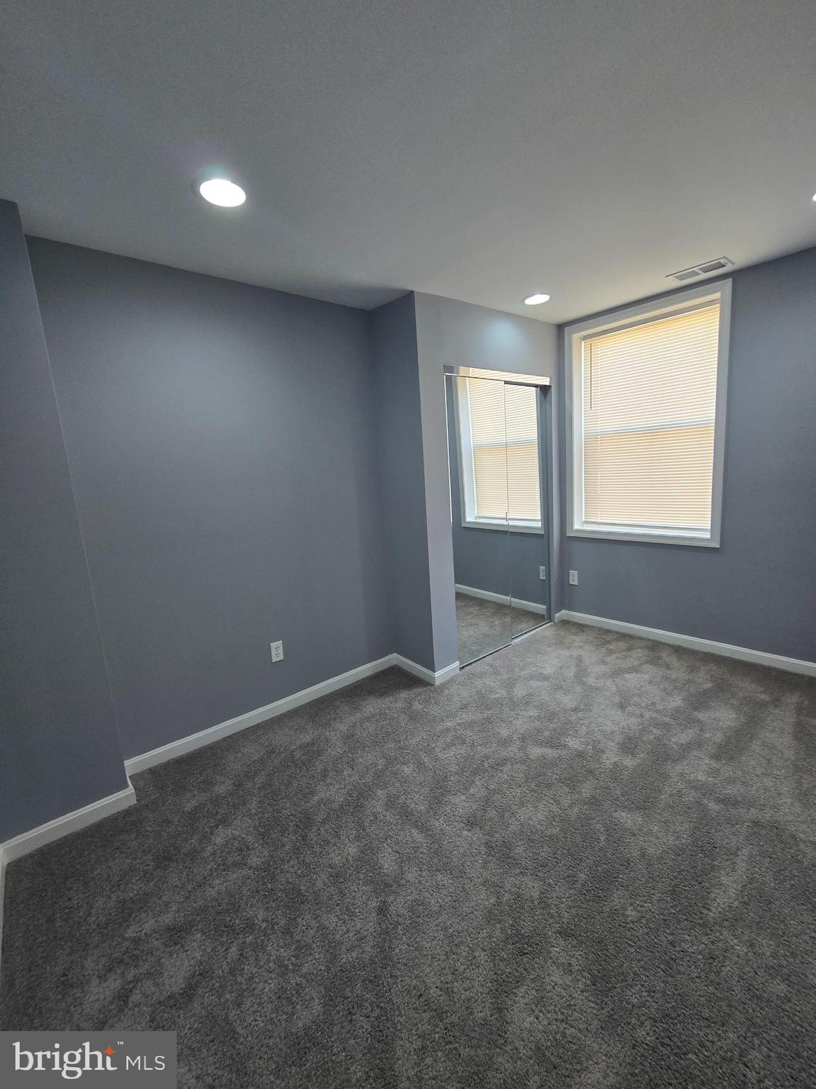 1926 North Payson Street Baltimore, MD 21217 - Photo 20 of 29 an empty room with windows