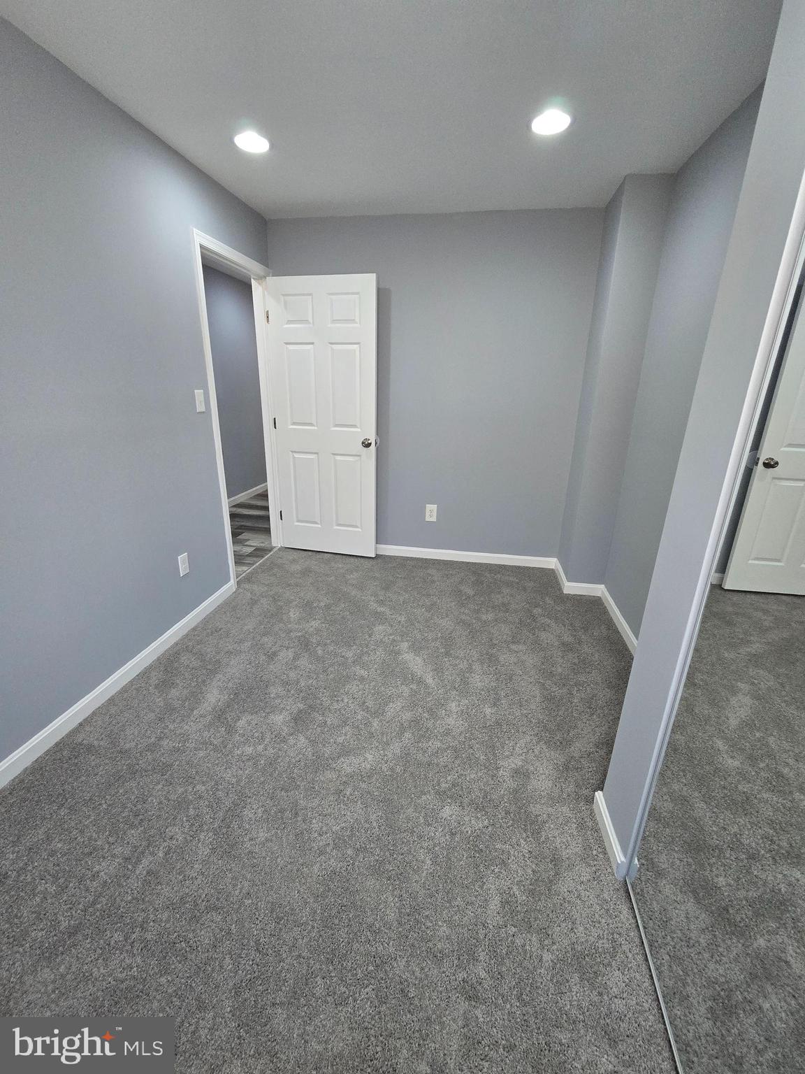 1926 North Payson Street Baltimore, MD 21217 - Photo 21 of 29 an empty room with windows