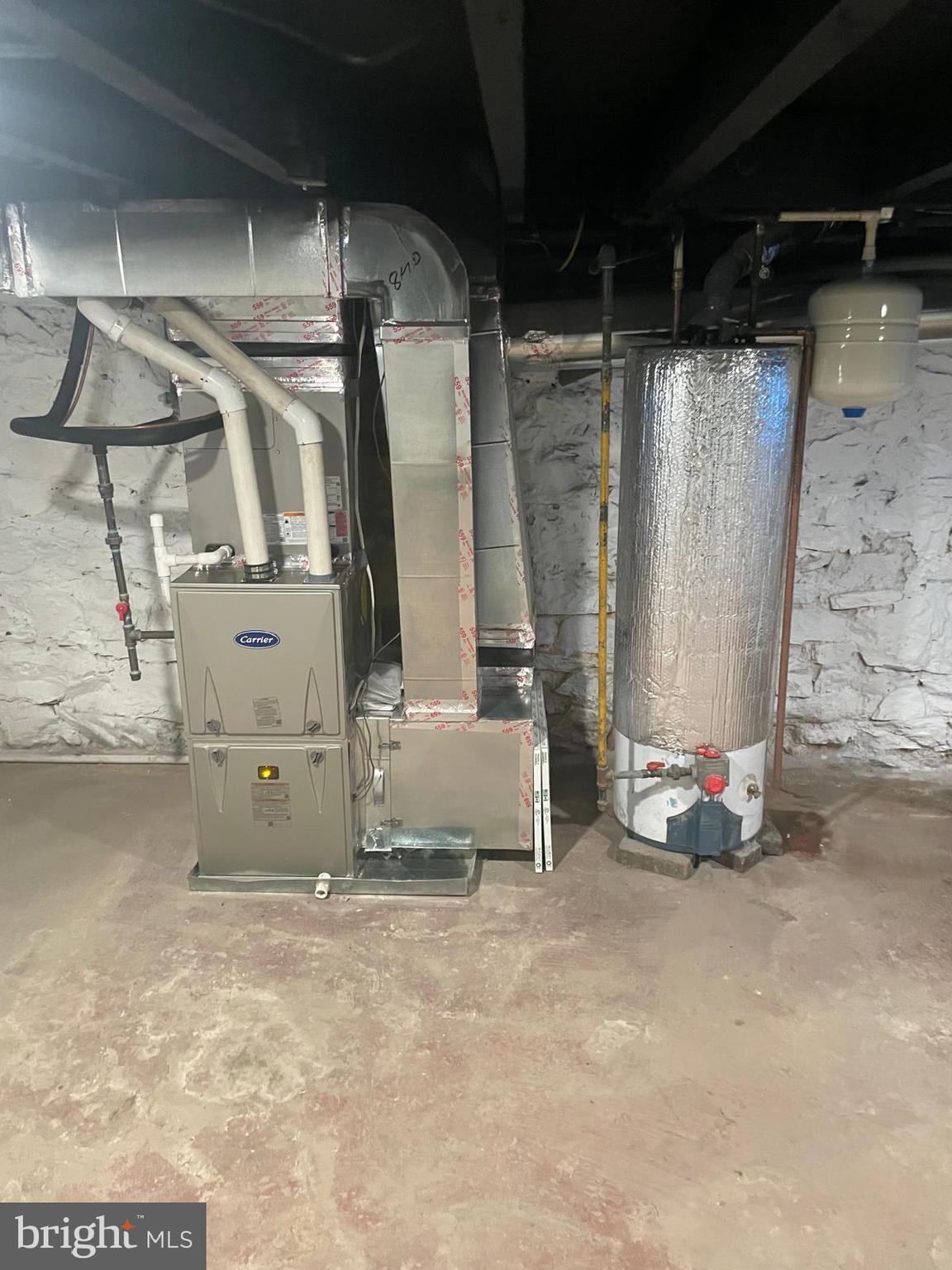 1926 North Payson Street Baltimore, MD 21217 - Photo 27 of 29 a view of walk in closet with clothes and shoes