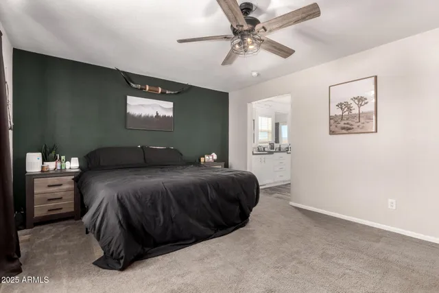 a bathroom with a sink double vanity granite and a mirror