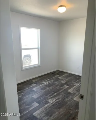 a kitchen with a stove and cabinets