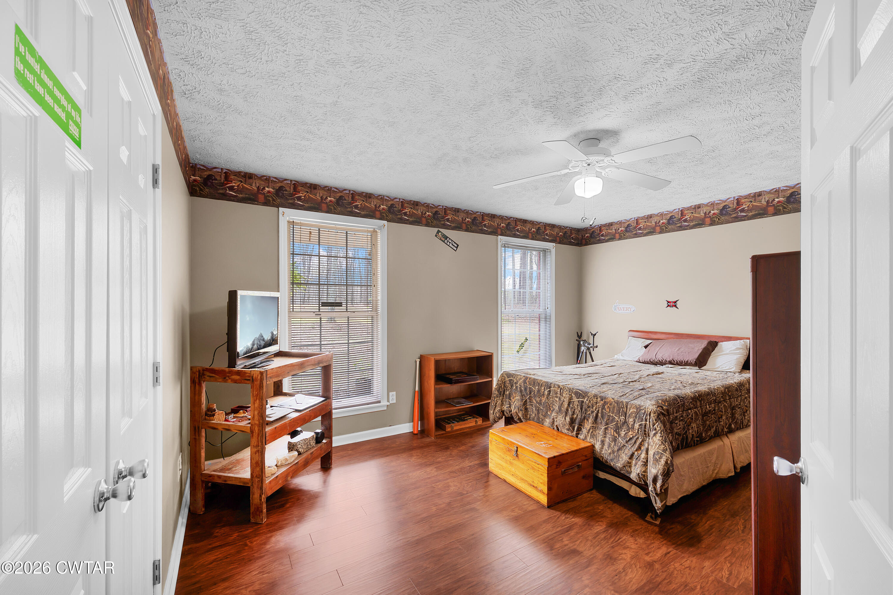 164 Mathis Crossing Road Milan, TN 38358 - Photo 24 of 33 a bedroom with a bed and furniture