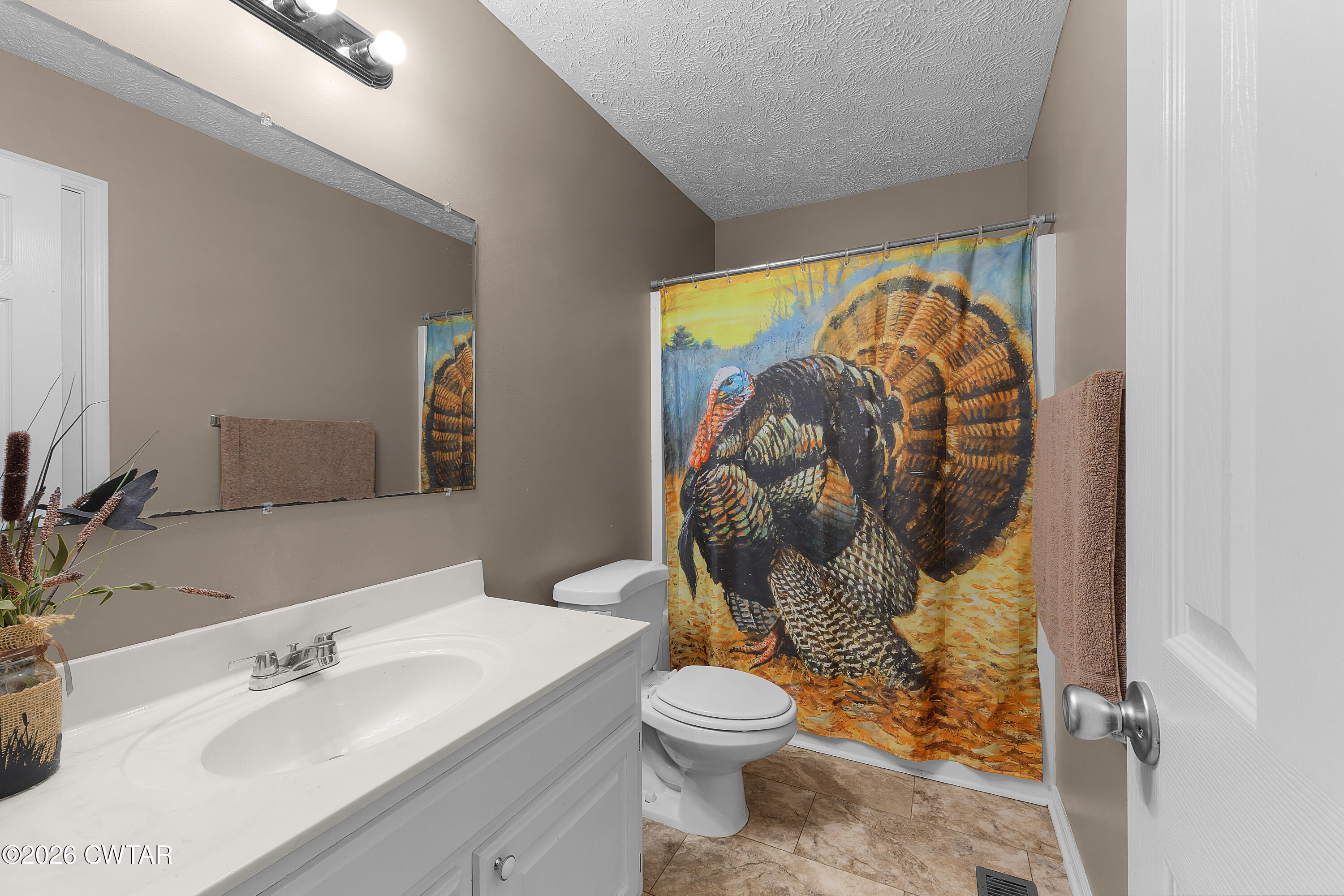 164 Mathis Crossing Road Milan, TN 38358 - Photo 25 of 33 a bathroom with a toilet sink and mirror
