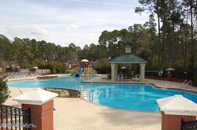 1212 Ribbon Road St. Johns, FL 32259 - Photo 6 of 10 a view of a swimming pool with a patio