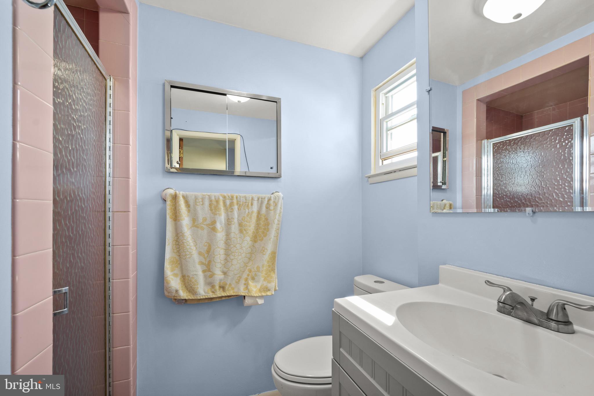 1966 King Arthur Road Philadelphia, PA 19116 - Photo 18 of 35 a bathroom with a toilet sink and mirror