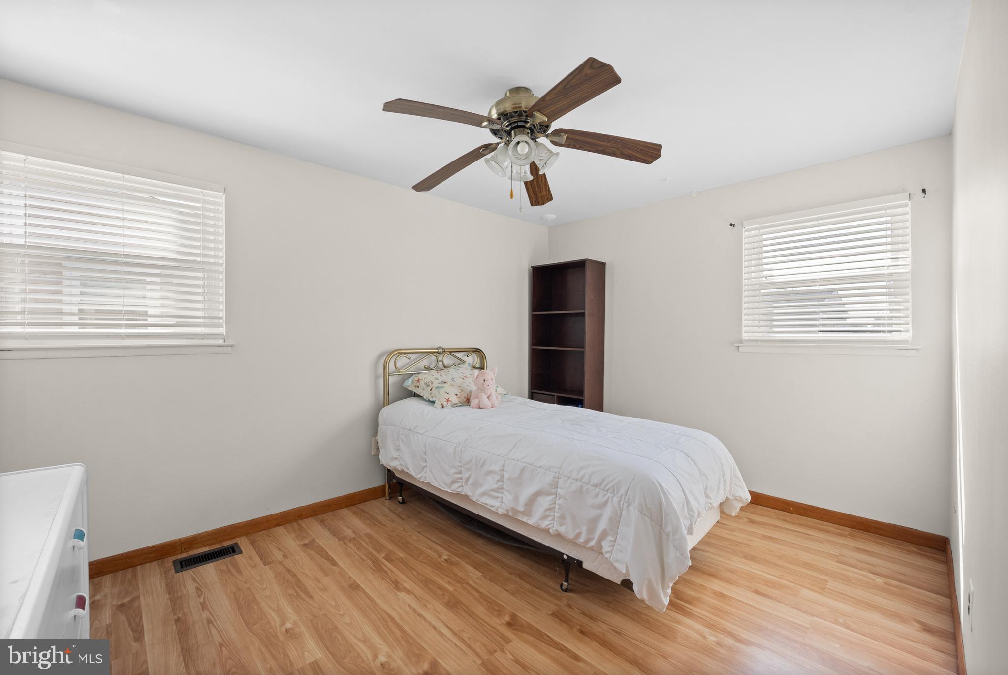 1966 King Arthur Road Philadelphia, PA 19116 - Photo 19 of 35 a bedroom with a bed and wooden floor