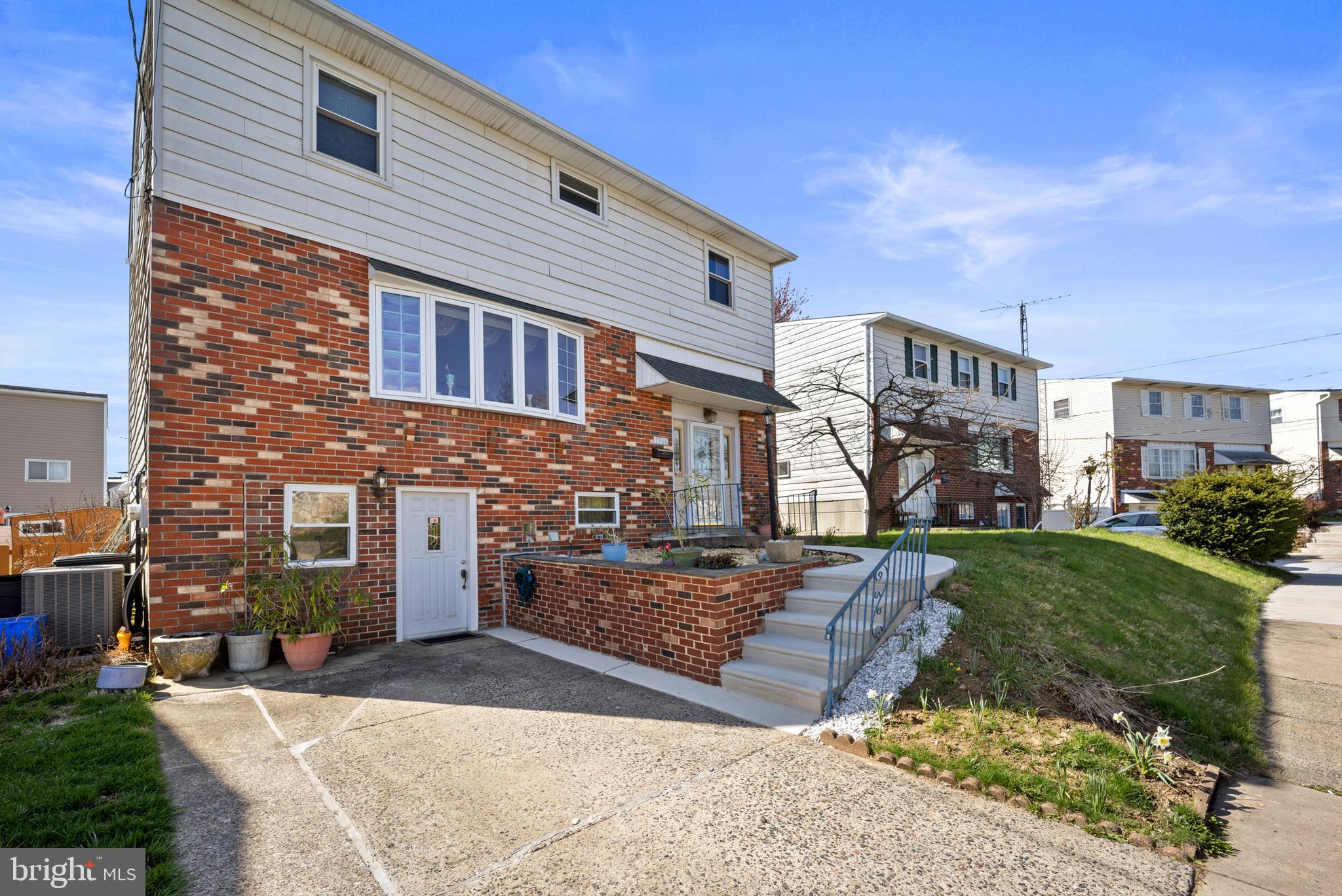 1966 King Arthur Road Philadelphia, PA 19116 - Photo 2 of 35 a front view of a house with garden