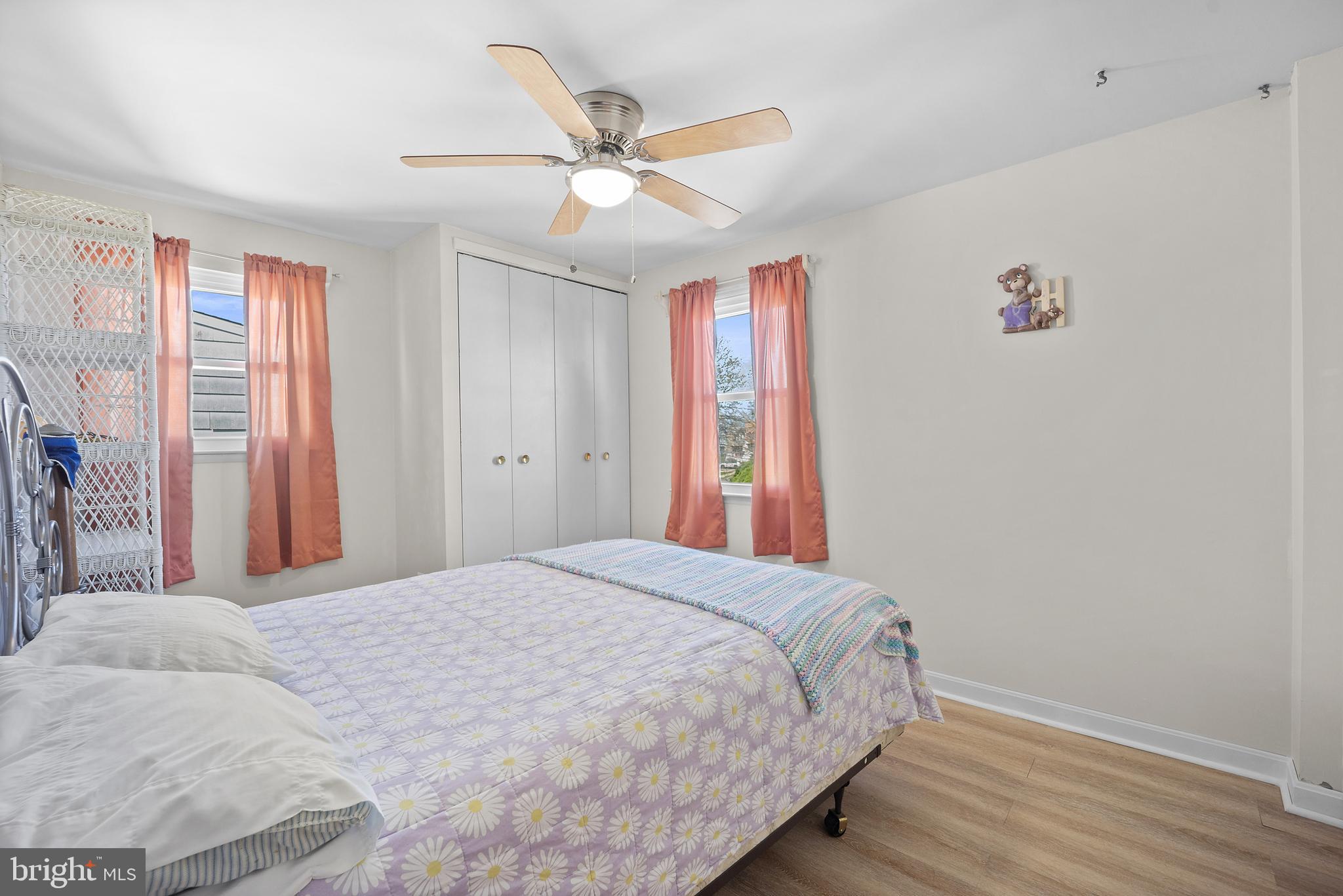 1966 King Arthur Road Philadelphia, PA 19116 - Photo 21 of 35 a bedroom with a large bed and a chandelier