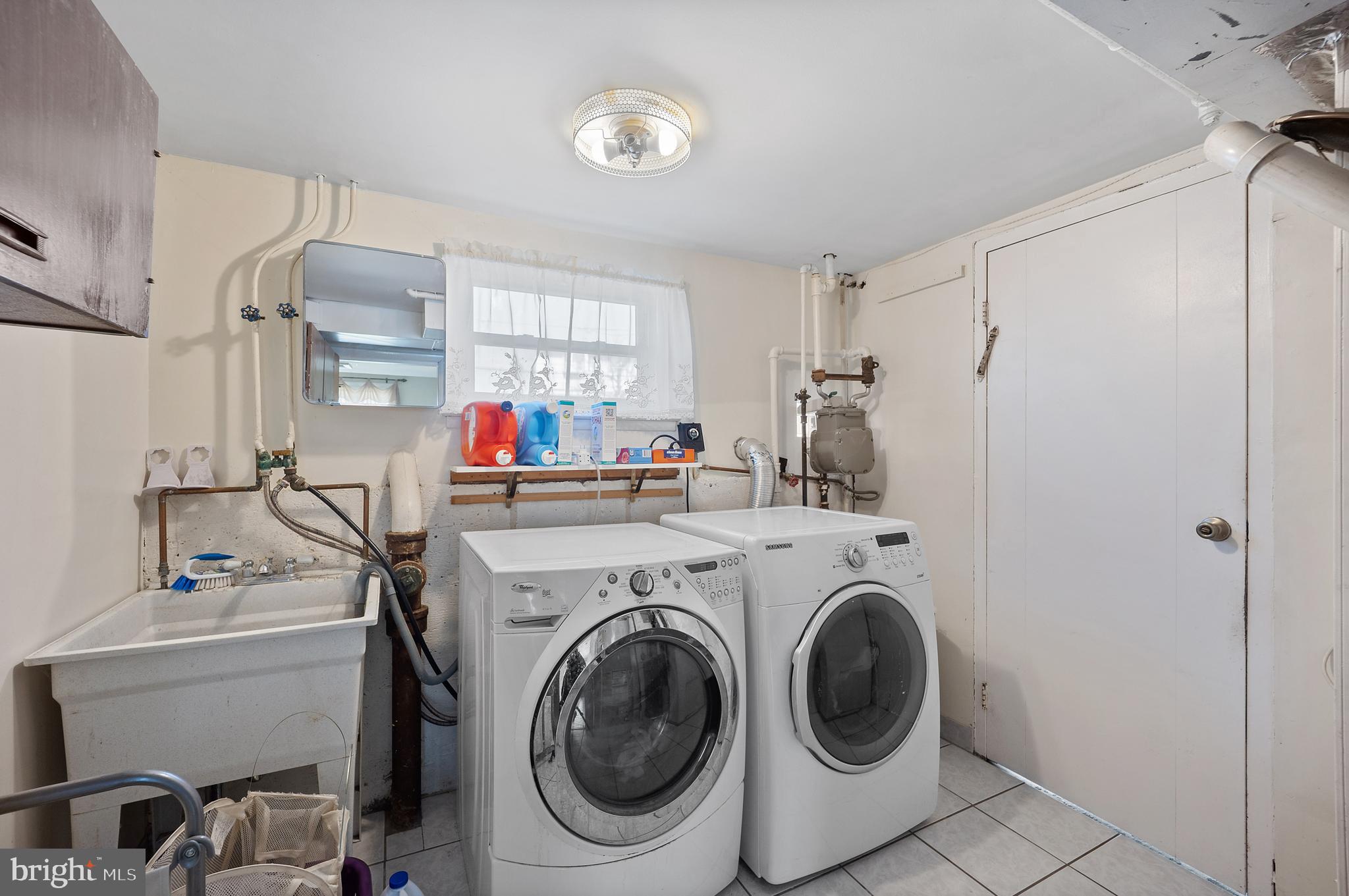 1966 King Arthur Road Philadelphia, PA 19116 - Photo 30 of 35 a utility room with sink dryer and washer
