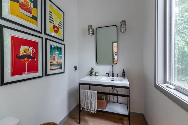 a bathroom with a sink and a mirror