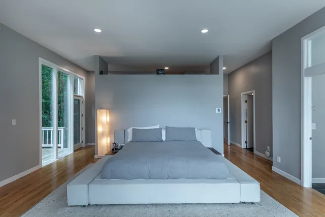 a living room with furniture and windows