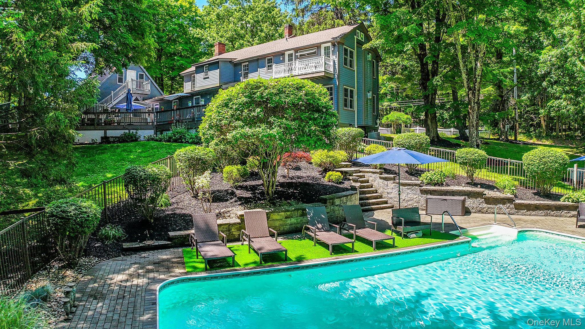 195 Pressler Road Wallkill, NY 12589 - Photo 40 of 47 Inground heated salt water poolwith beautiful landscaping