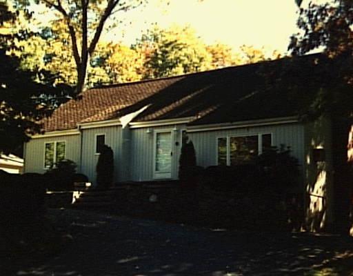44 Old Sawmill Road Trumbull, CT 06611 - Photo 1 of 1 a front view of house with green space
