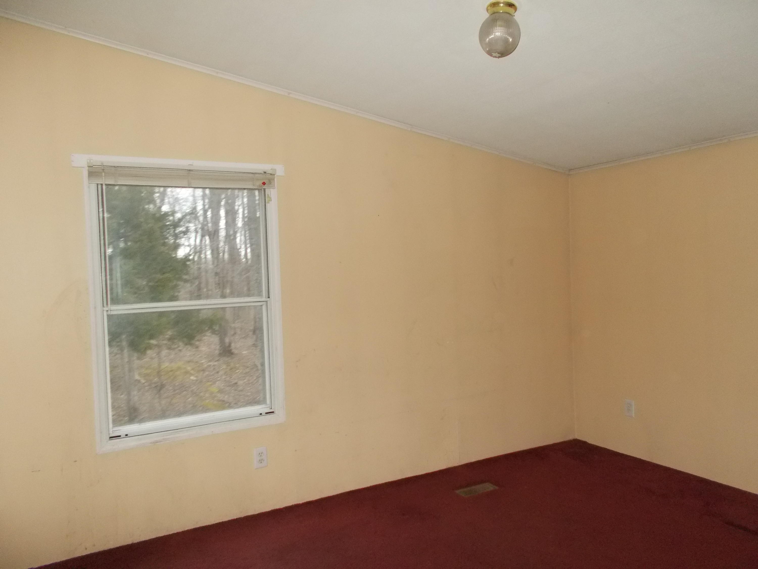3132 Quarles Road Thaxton, VA 24174 - Photo 25 of 34 an empty room with a window