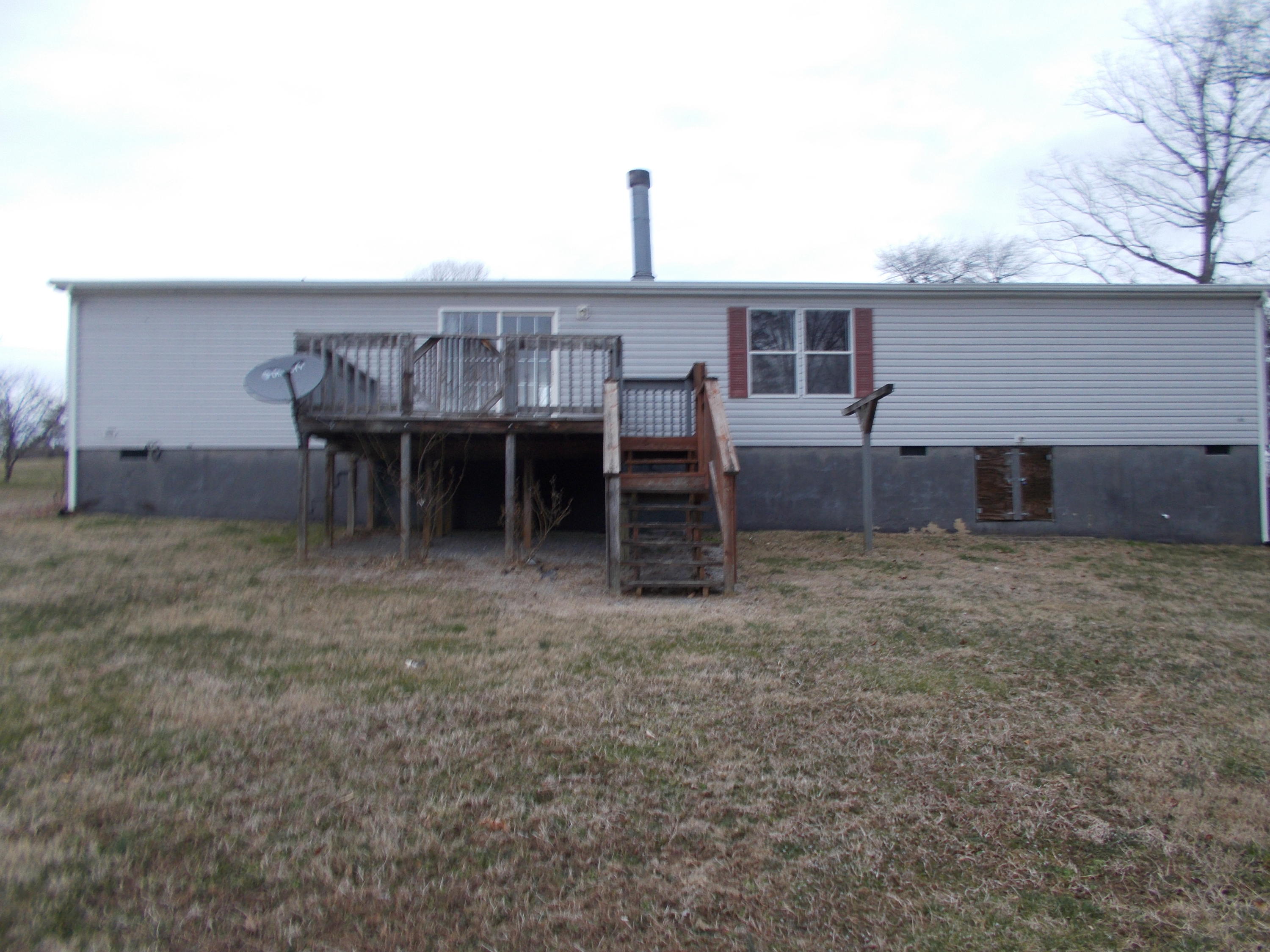 3132 Quarles Road Thaxton, VA 24174 - Photo 10 of 34 a view of house with backyard and furniture