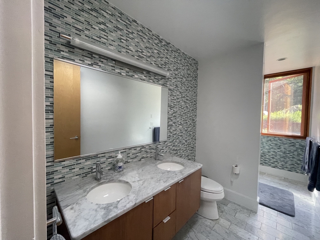 4 Solstice Way Sharon, MA 02067 - Photo 13 of 22 a bathroom with a granite countertop sink toilet and shower