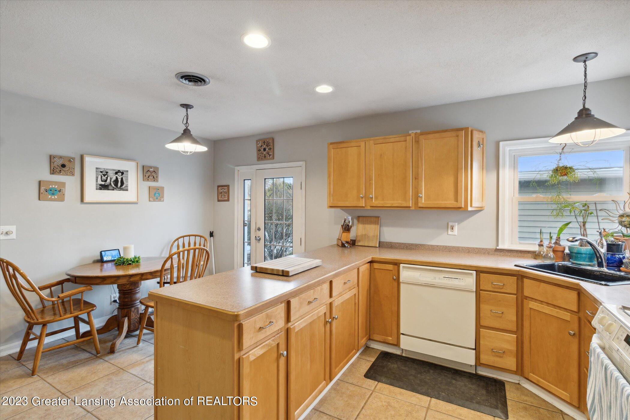 1013 Clark Road Lansing, MI 48917 - Photo 12 of 26 13-1013-Clark-Rd-Lansing-MI-48917-Window