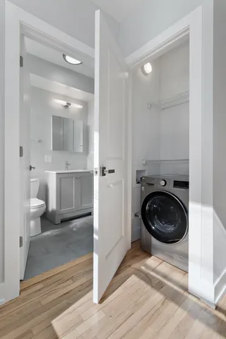 a bathroom with a toilet and a sink