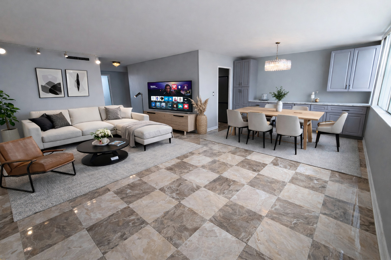 6301 North Sheridan Road, Unit 24E Chicago, IL 60660 - Photo 13 of 52 a living room with furniture a flat screen tv and a dining table