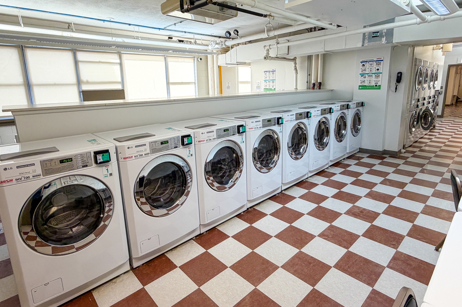 6301 North Sheridan Road, Unit 24E Chicago, IL 60660 - Photo 32 of 52 a utility room with dryer and washer