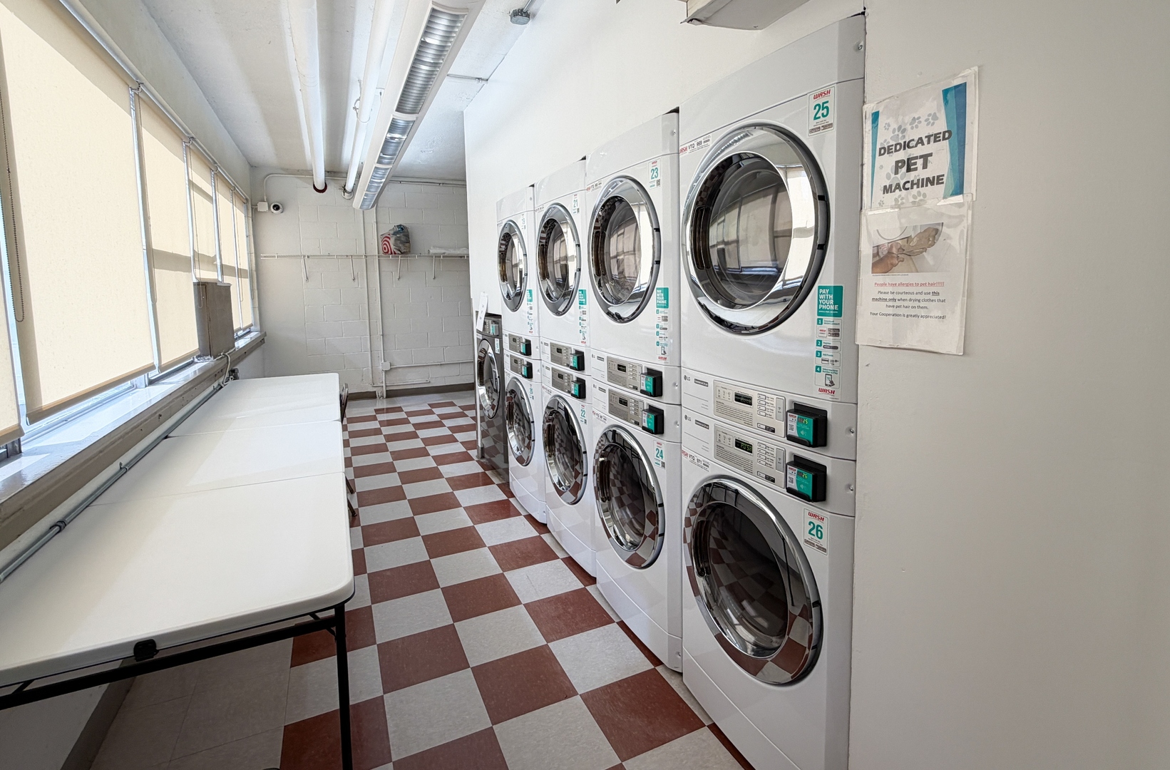 6301 North Sheridan Road, Unit 24E Chicago, IL 60660 - Photo 34 of 52 a utility room with dryer and washer