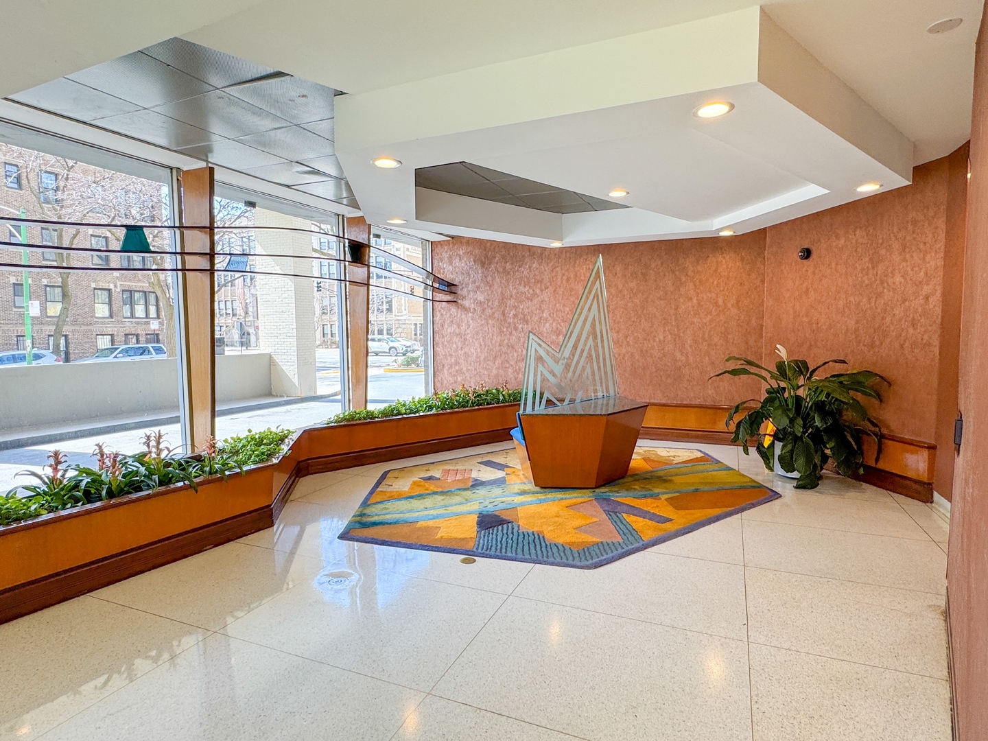 6301 North Sheridan Road, Unit 24E Chicago, IL 60660 - Photo 48 of 52 a bed room with a bed and a couch