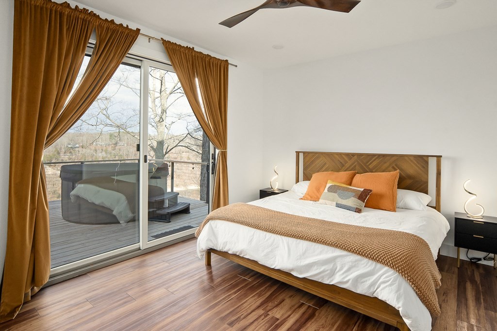 1171 Hutchins Bend Road Sparta, TN 38583 - Photo 25 of 74 a bedroom with a bed and a large window