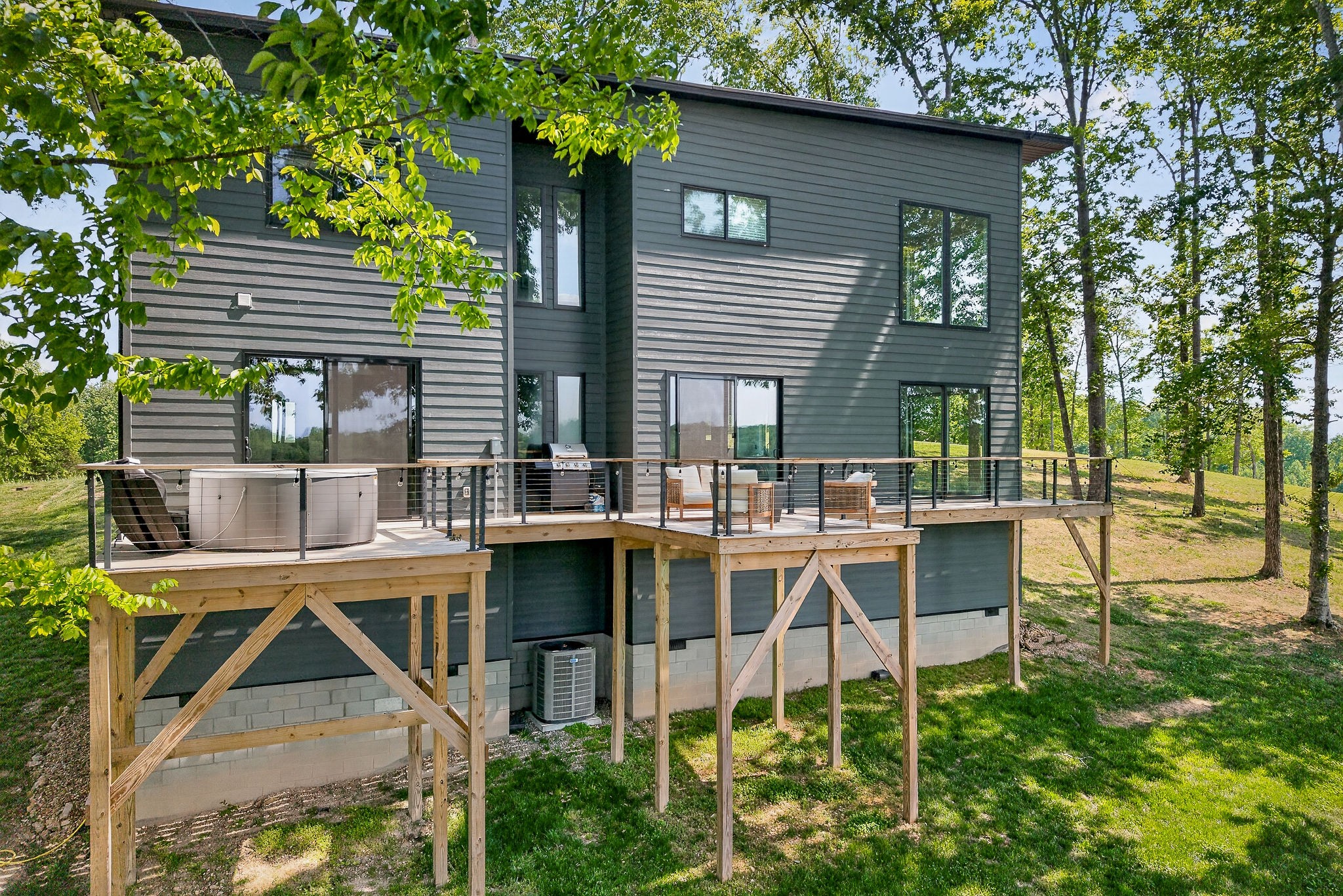 1171 Hutchins Bend Road Sparta, TN 38583 - Photo 51 of 74 a view of a house with backyard porch and sitting area