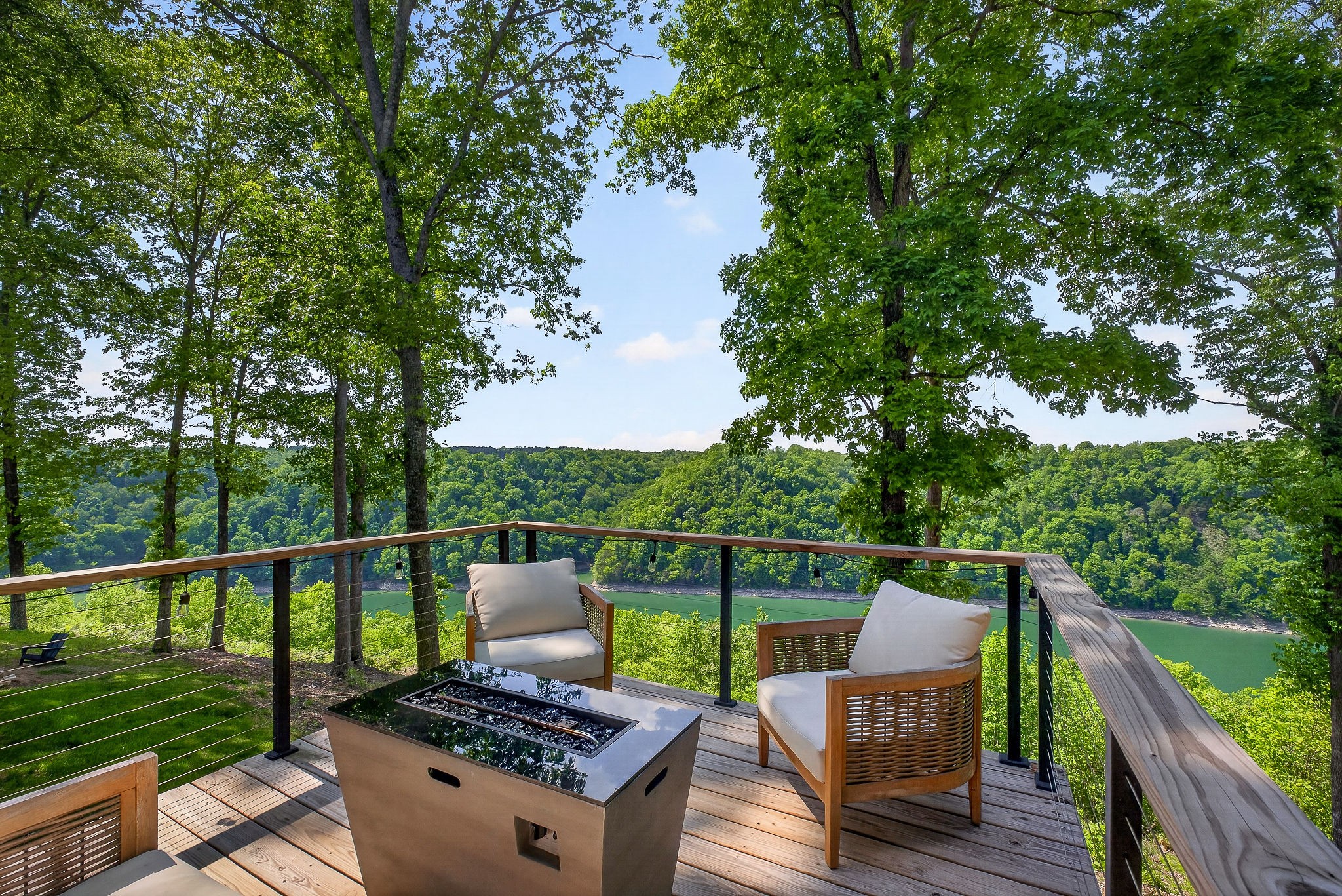 1171 Hutchins Bend Road Sparta, TN 38583 - Photo 57 of 74 a view of a deck with chair and wooden floor