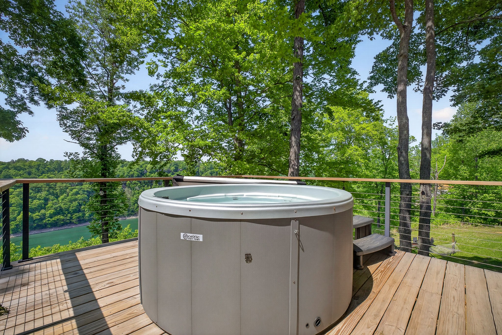 1171 Hutchins Bend Road Sparta, TN 38583 - Photo 59 of 74 a view of a deck with wooden floor and fence